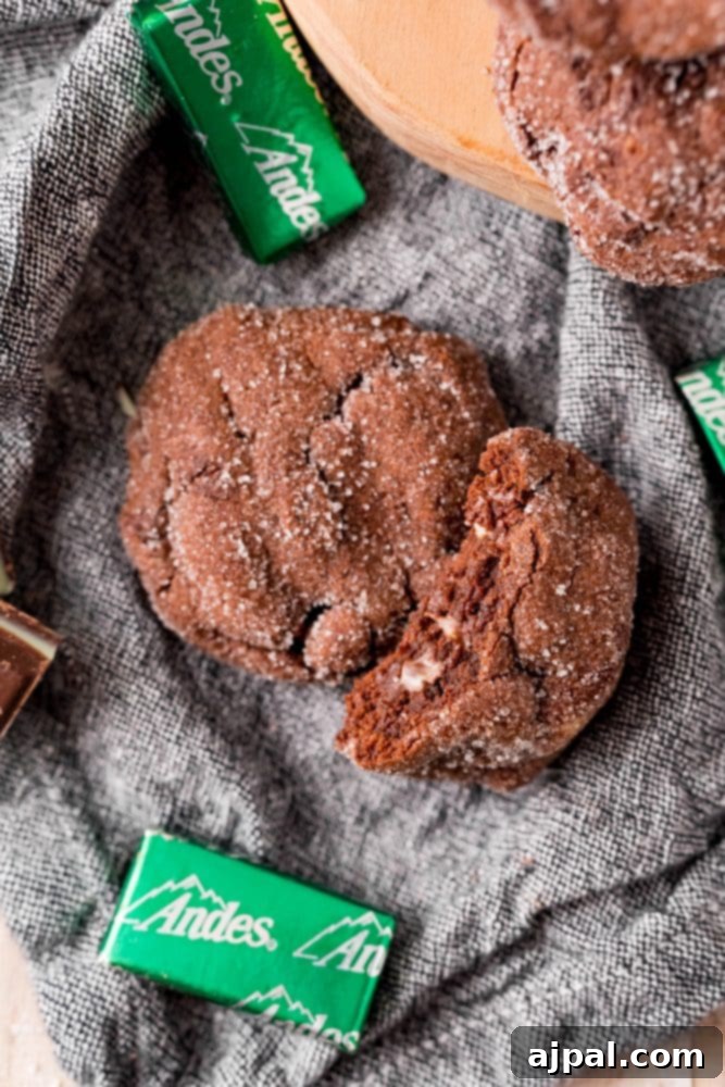 Andes Mint Lava Cookies 10 chocolate cookies with one with a bite out of it and andes mints around it