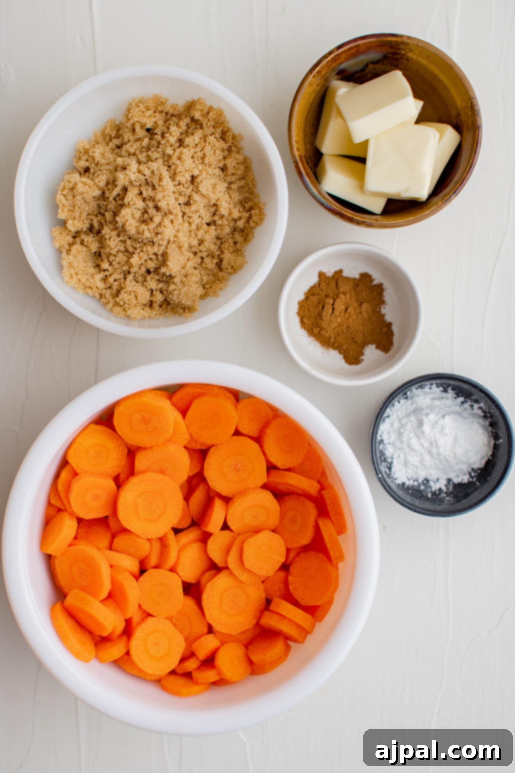 A bowl of sugar glazed carrots.
