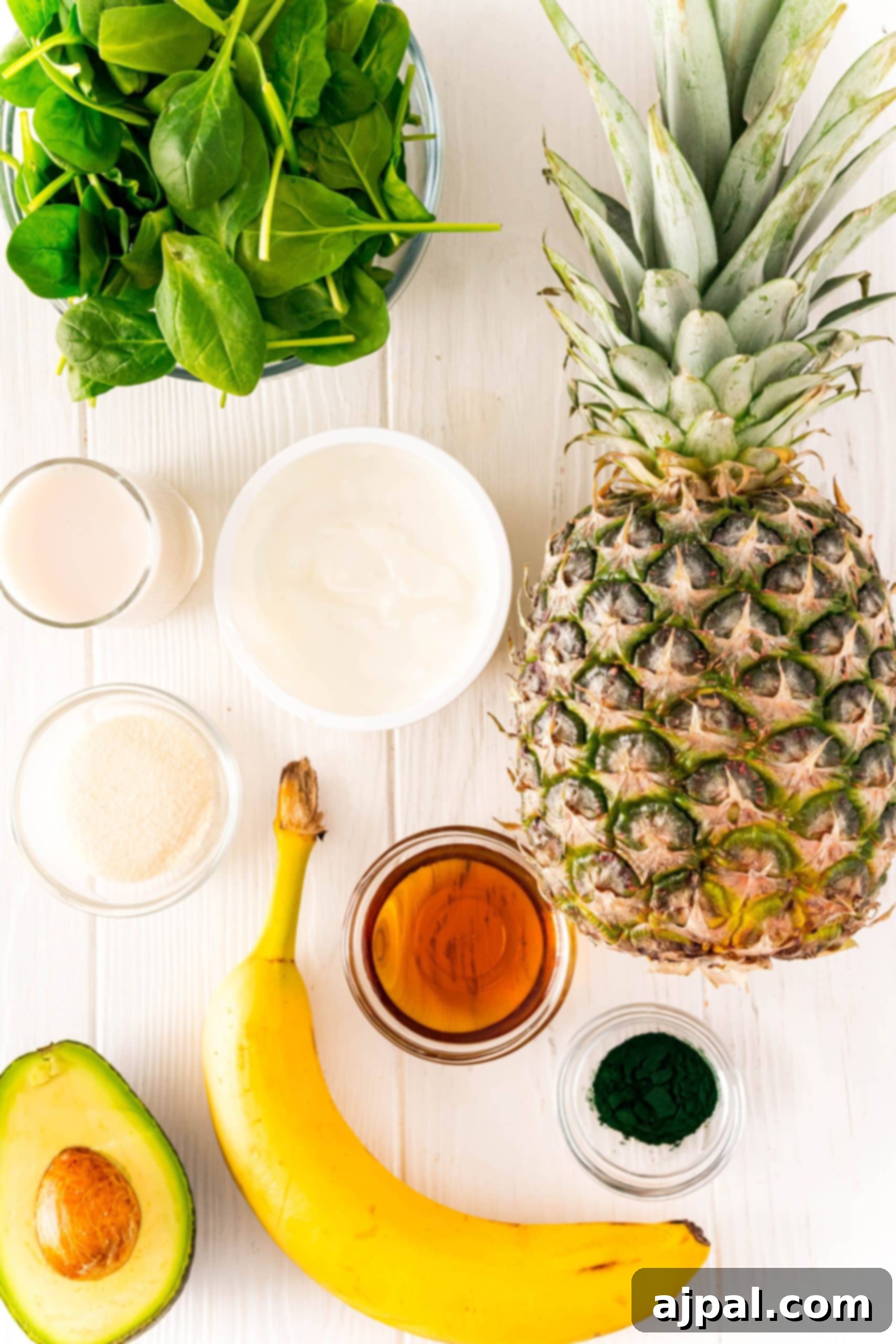 Sunshine Green Smoothie Boost 6 Easy tropical green smoothie recipe with banana, spinach and avocado.
