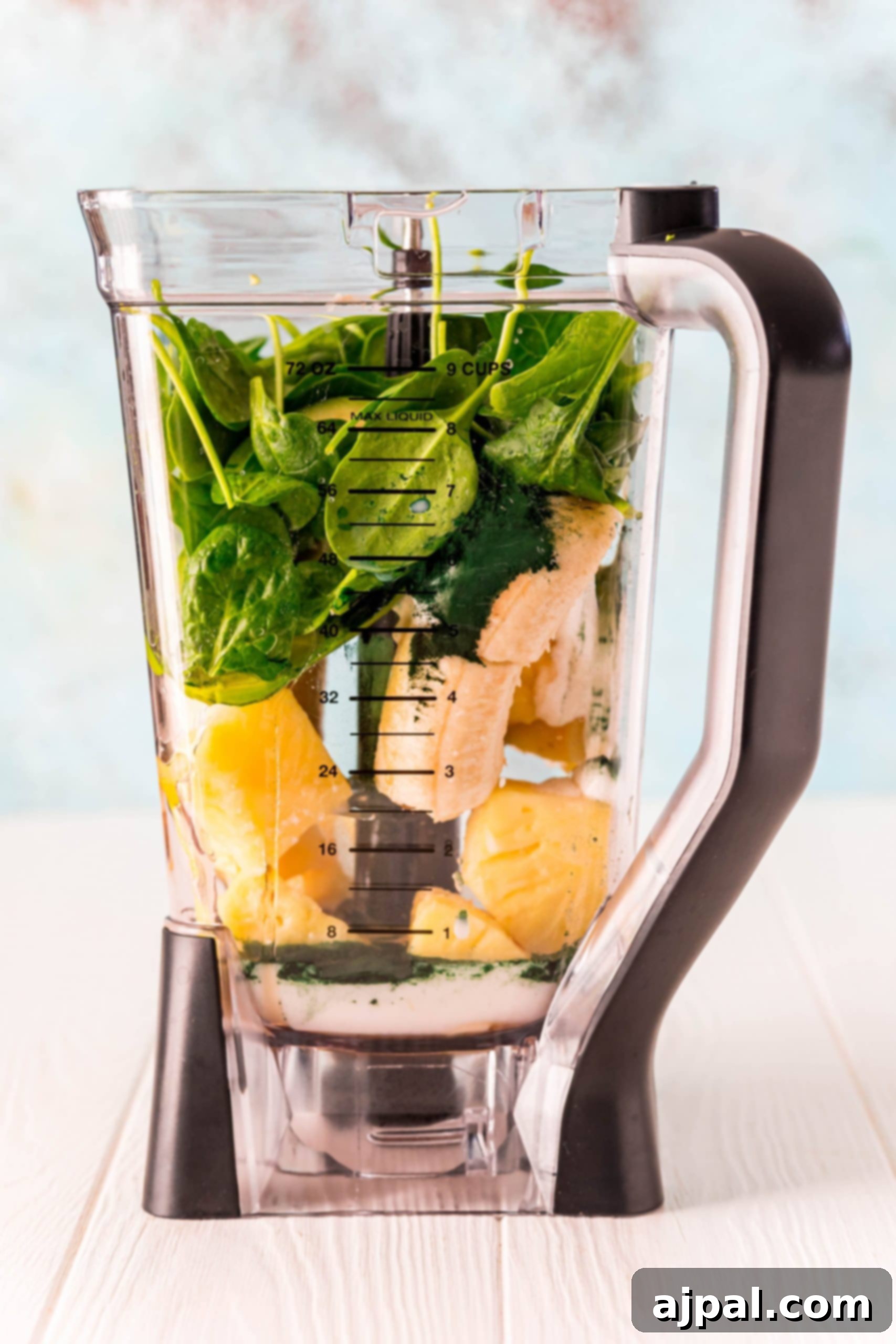 Sunshine Green Smoothie Boost 7 A healthy green smoothie filled with spinach and other vegetables.