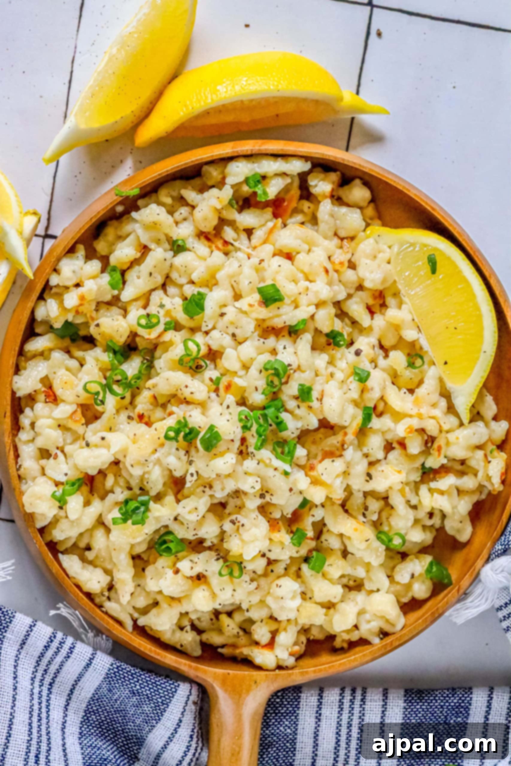 Effortless Homemade Spaetzle 8 spaetzle in a wood dish on a table