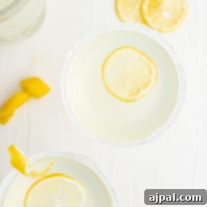 Zesty Lemon Drop Martini Recipe 11 Lemon margaritas with a slice of lemon, perfect for a refreshing twist on the classic lemon drop martini recipe.