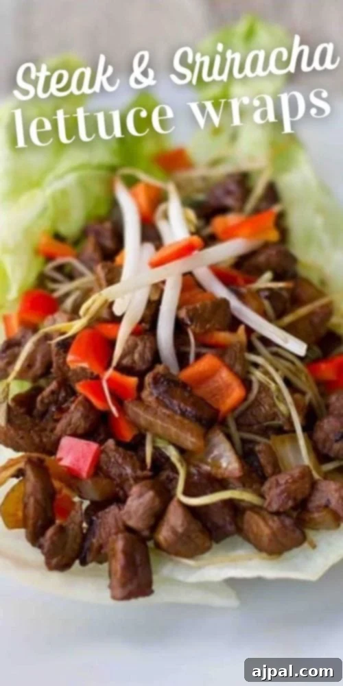 steak sriracha cubes in lettuce cups with pea shoots and chopped bell peppers