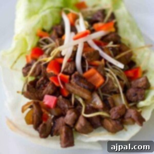 Keto beef lettuce wraps served on a white plate.