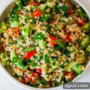 An easy tabbouleh salad made with tomatoes and cucumbers, ready to be prepared.