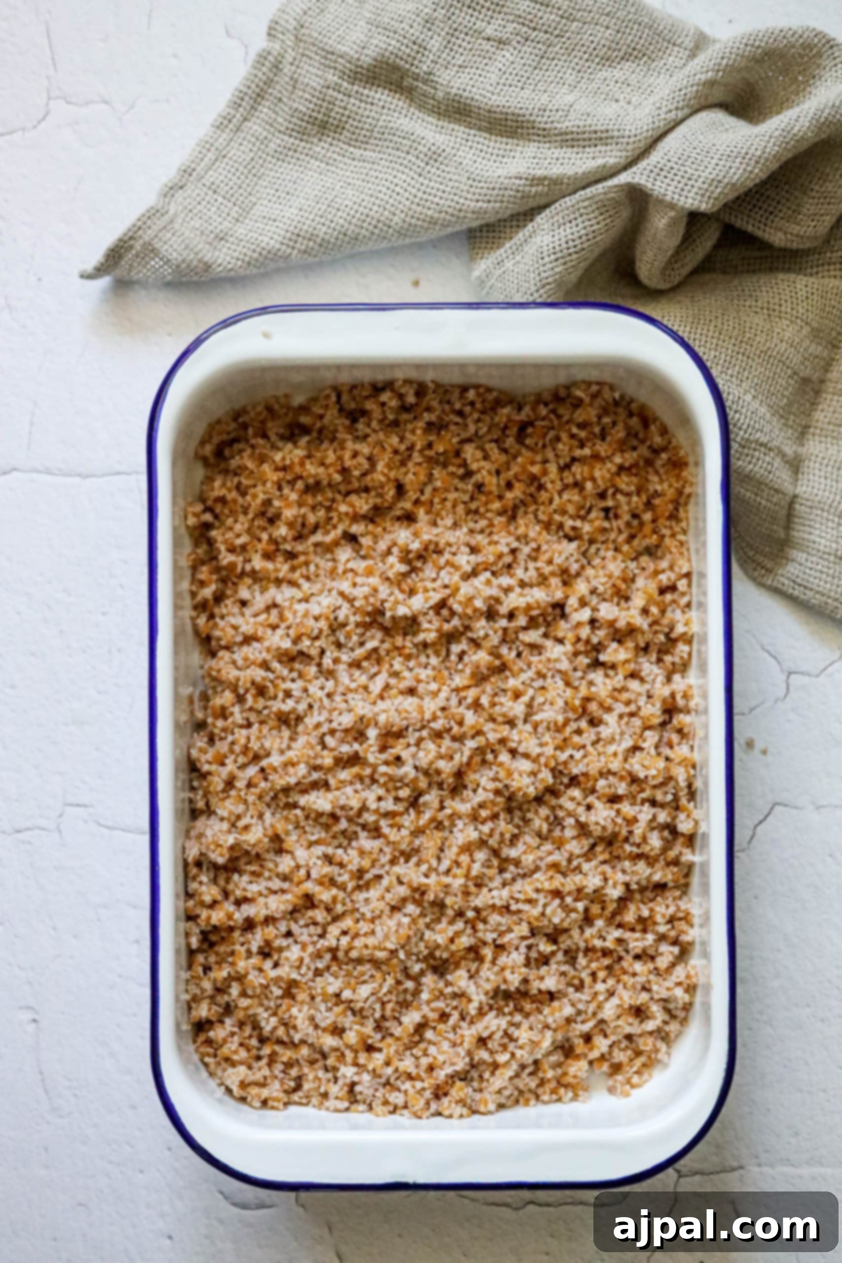 Picture of drained bulgur in a dish, ready for mixing with other ingredients.