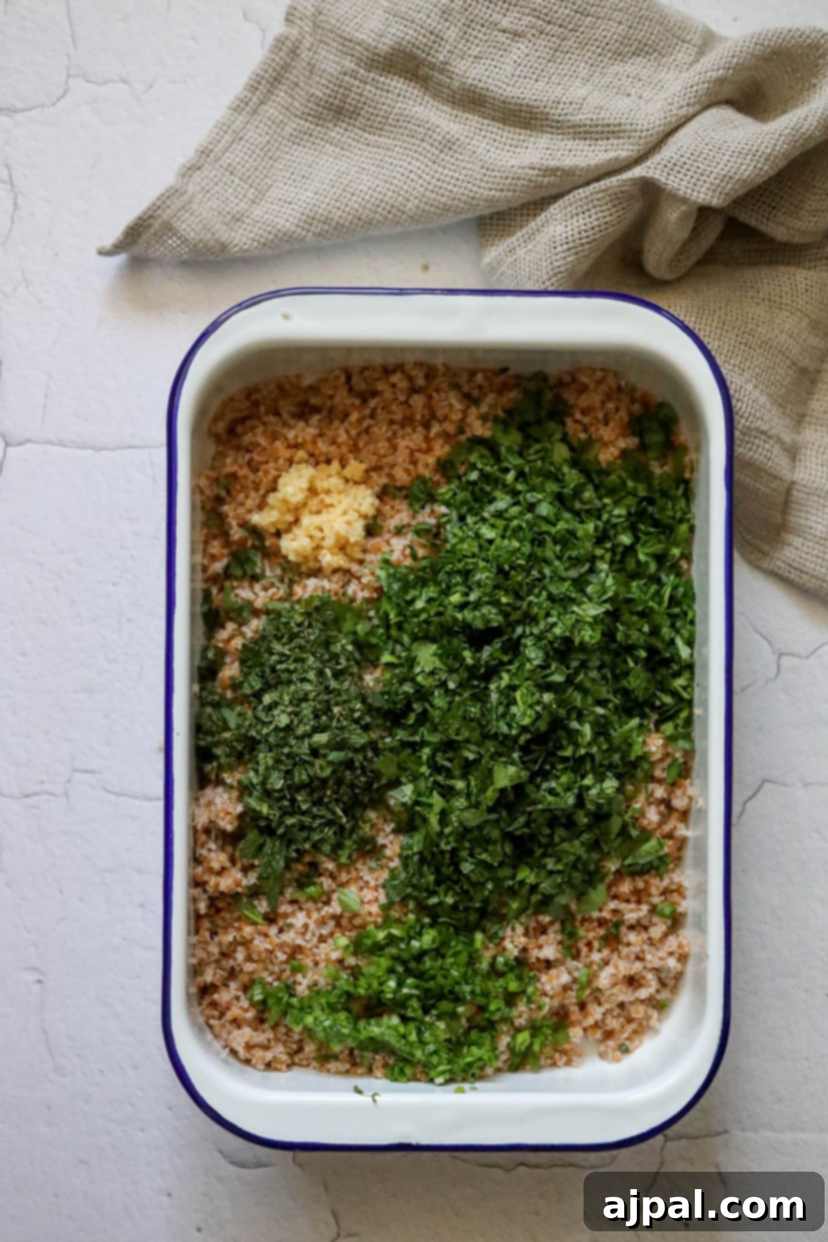 Picture of bulgur with parsley, mint, green onion, and garlic, illustrating the complete herb and aromatic base.