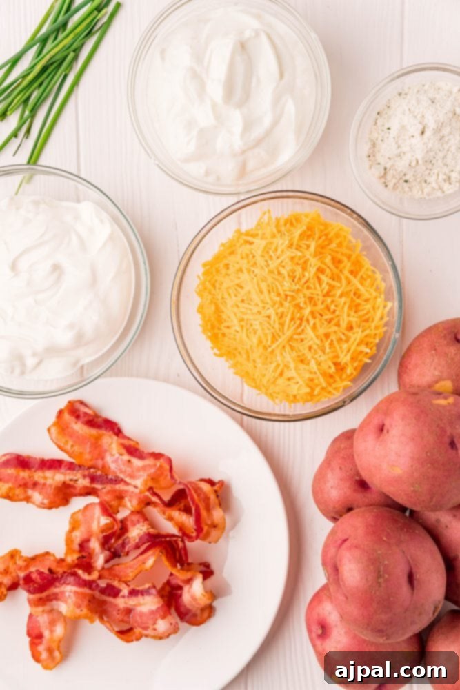 ranch, mayonnaise, potatoes, bacon, cheese, and chives in plates on a table