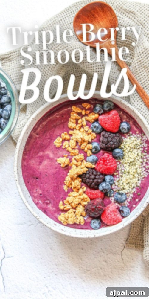 Triple Berry Smoothie Bowls 11 A vibrant and nutritious triple berry smoothie bowl recipe, garnished with fresh berries and healthy toppings, perfect for a quick and wholesome meal.