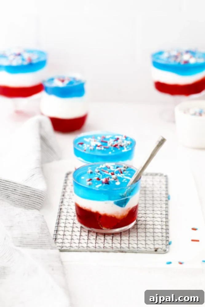Star-Spangled Jello Cups 4 4th of July trifle featuring red, white, and blue jello cups.