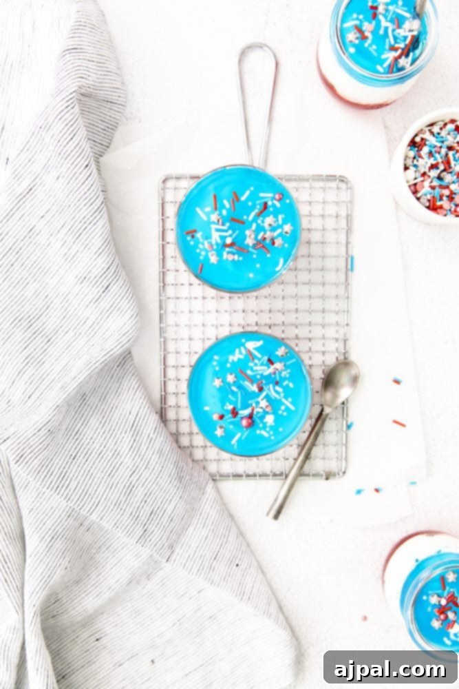 Star-Spangled Jello Cups 5 4th of July ice cream with sprinkles served on a cooling rack.