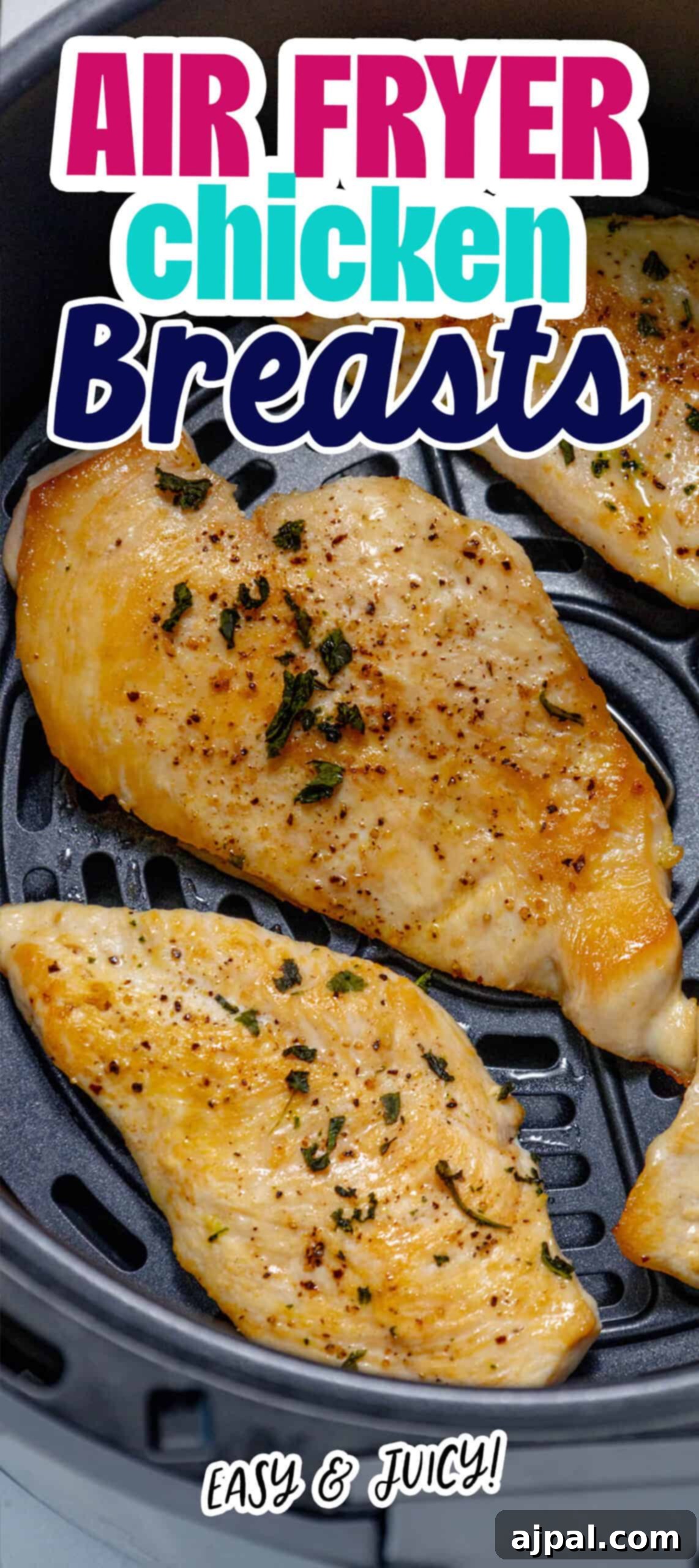 Keto air fried chicken breasts. A vertical shot of perfectly cooked, golden-brown air-fried chicken breasts.