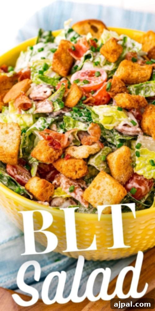Effortless BLT Salad 7 salad with tomato, croutons, bacon, and dressing