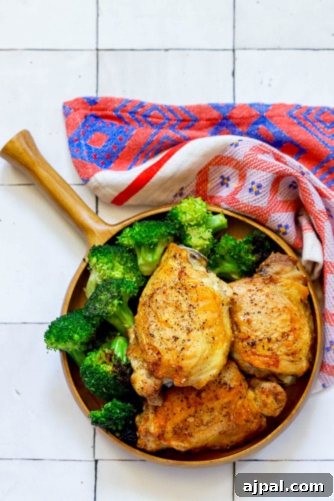 Crispy Air Fryer Chicken Thighs 4 Chicken and broccoli cooked in an air fryer.