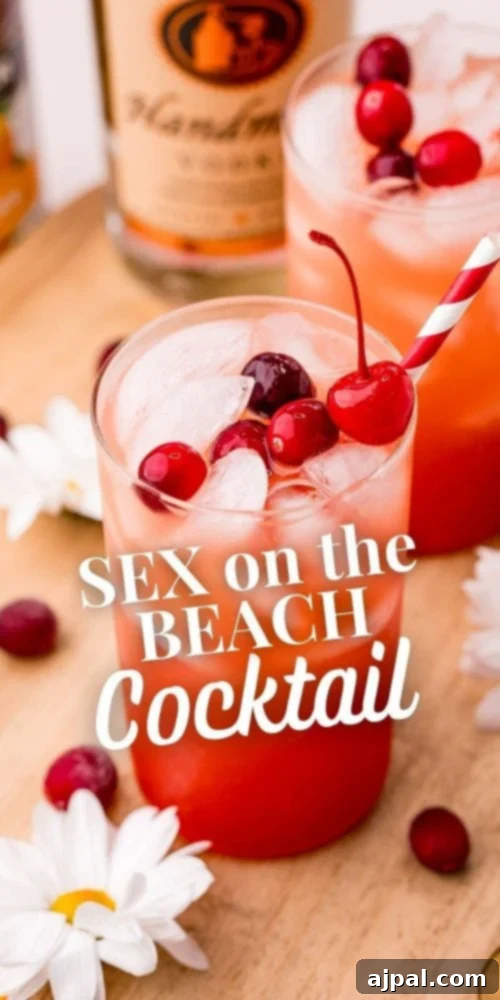 The Ultimate Sex on the Beach Cocktail Guide 11 A Sex on the Beach cocktail in a tall glass, garnished with fruit, highlighting the refreshing tropical drink.