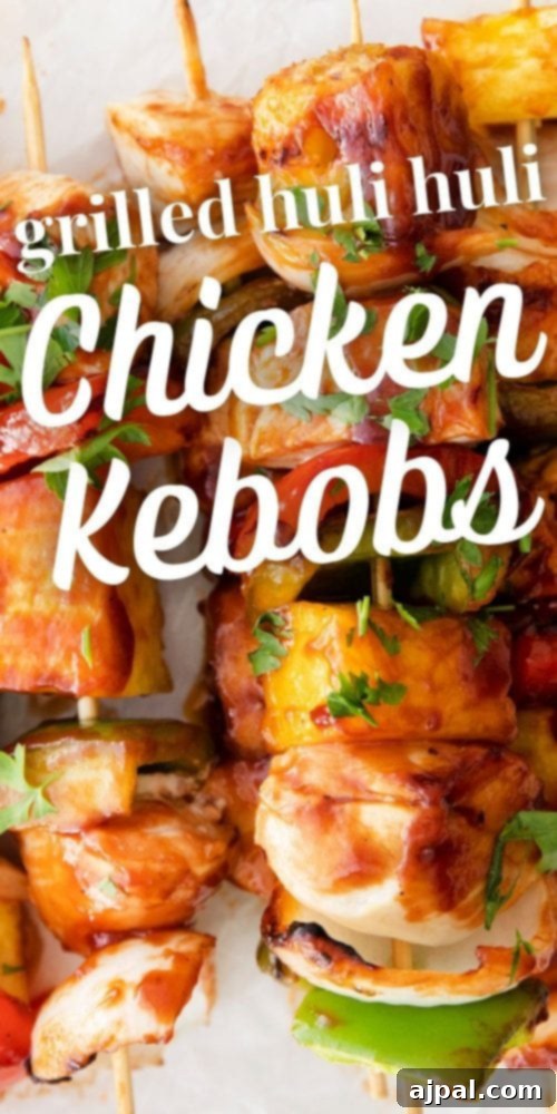 Huli Huli chicken kebobs – Hawaiian style grilled skewers, bursting with color and flavor, arranged on a plate for serving.