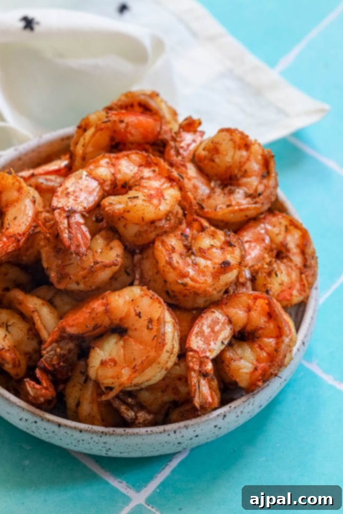 Perfectly Blackened Air Fryer Shrimp 4 Grilled shrimp in an air fryer.