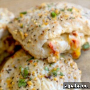 Picture of stuffed pork chops on a wooden cutting board