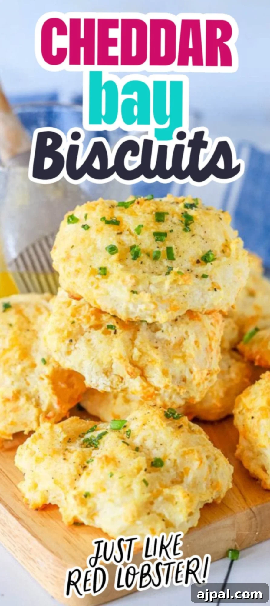 Whip Up Irresistible Cheesy Garlic Biscuits 7 Red Lobster cheddar bay biscuits recipe on a cutting board.