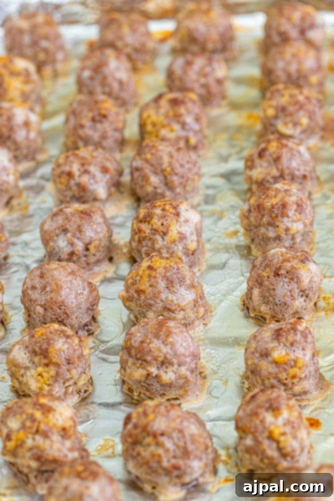 picture of baked meatballs on a baking sheet