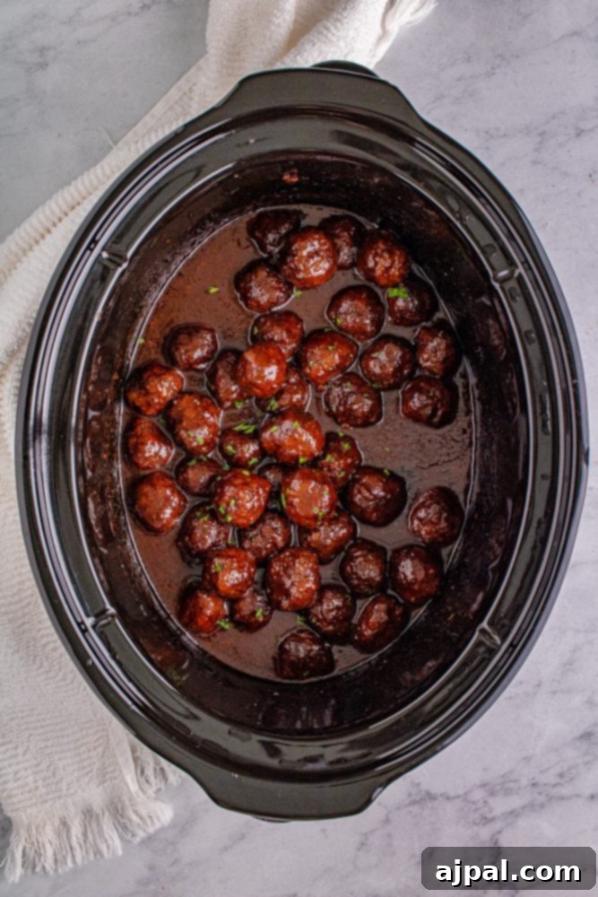 picture of grape jelly meatballs in a slow cooker