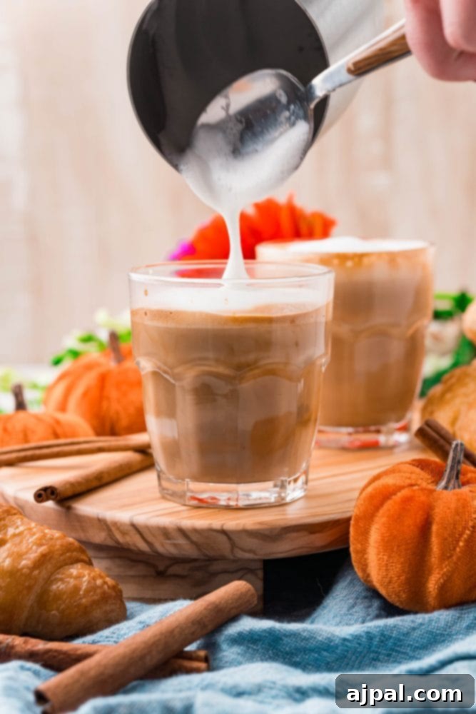 A small mug with a shot of dark, rich espresso, the base for a robust pumpkin spice latte.