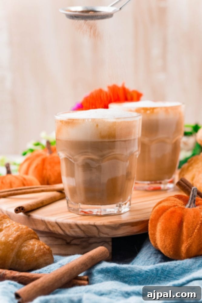 A bottle of pumpkin pie flavored syrup, ready to infuse your latte with seasonal taste.
