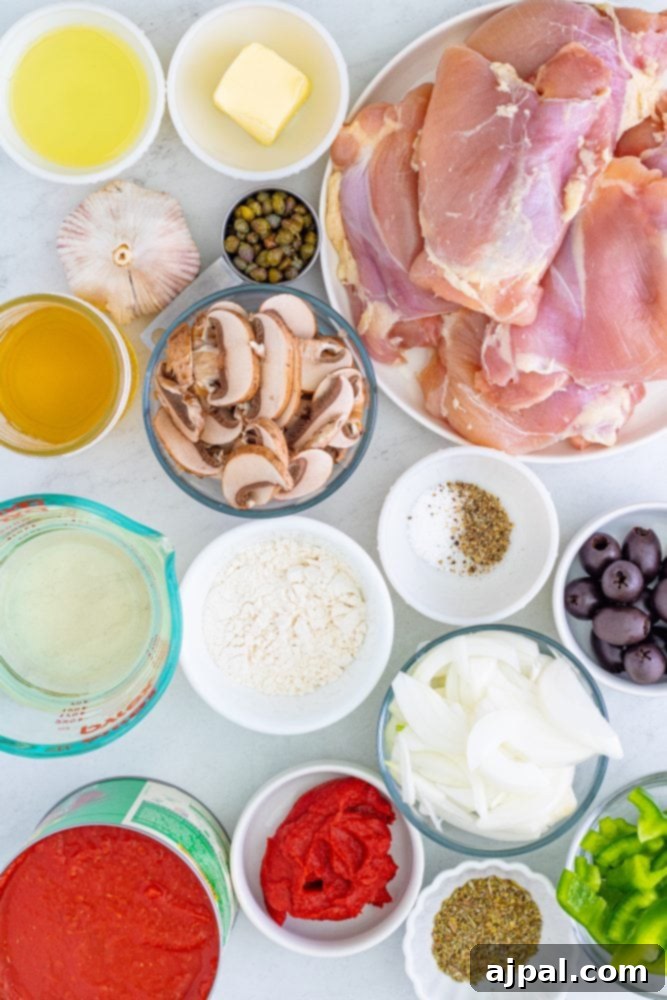 Simple Steps to Perfect Chicken Cacciatore 5 A vibrant display of fresh ingredients for Chicken Cacciatore, including chicken thighs, olives, mushrooms, capers, garlic, onions, bell peppers, and flour.