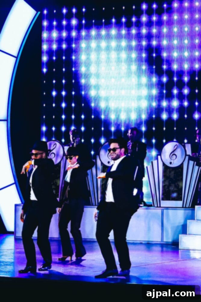 Cruising Post-Pandemic: A Reality Check 7 picture of men dancing on stage at a Princess cruises theater