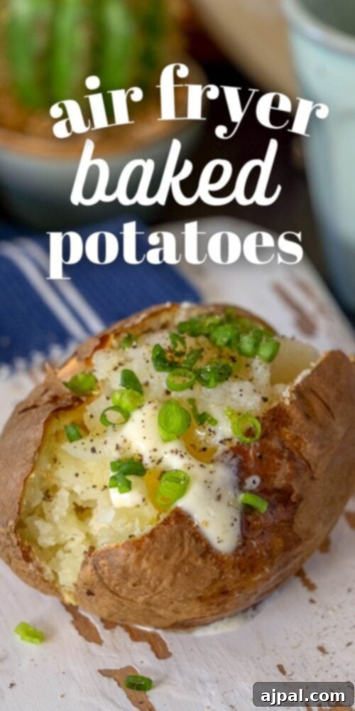 picture of a baked potato on a wood cutting board with butter and chives on top 
