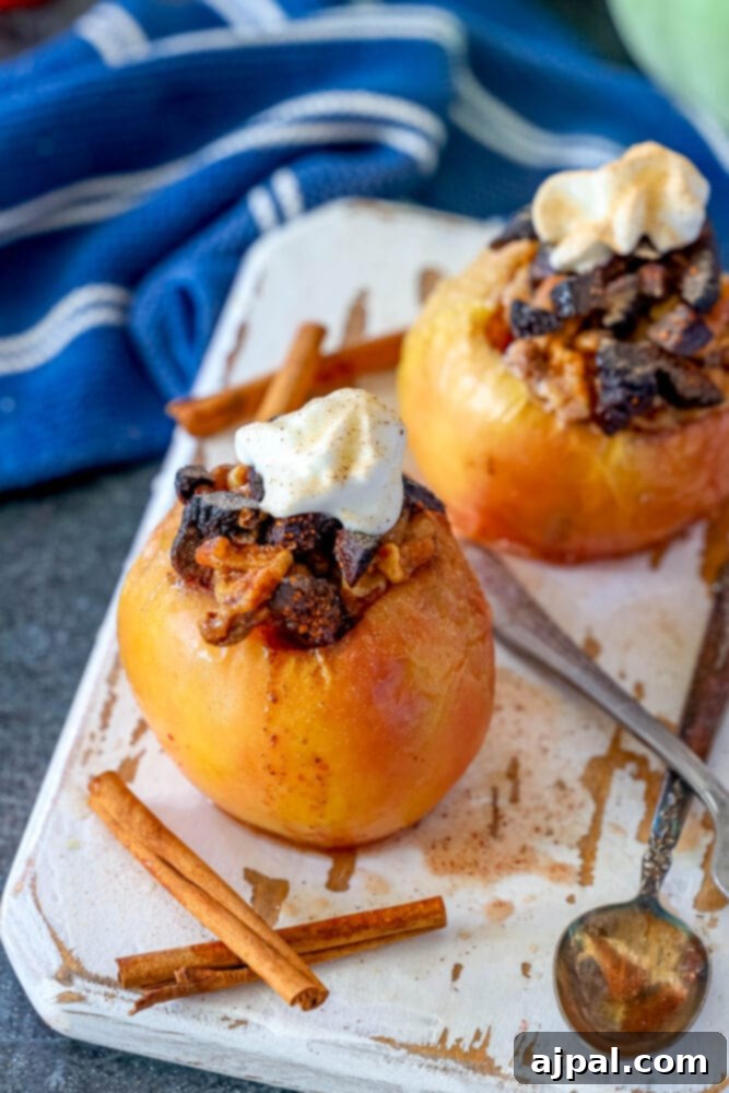 Simple Baked Apples with Figs 2 picture of baked apple on a plate topped with figs and whipped cream