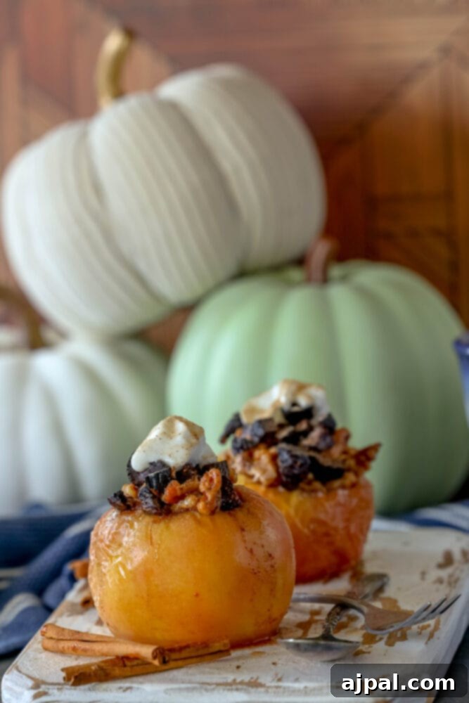 Simple Baked Apples with Figs 10 picture of baked apple on a plate topped with figs and whipped cream