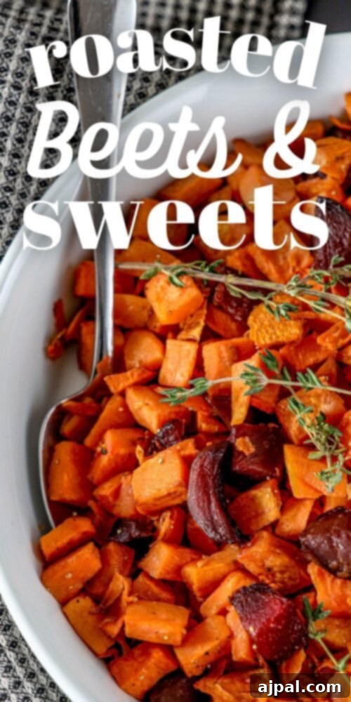 Effortless Roasted Beets & Sweet Potatoes 11 picture of roasted beets and sweet potatoes in a glass dish with thyme on top