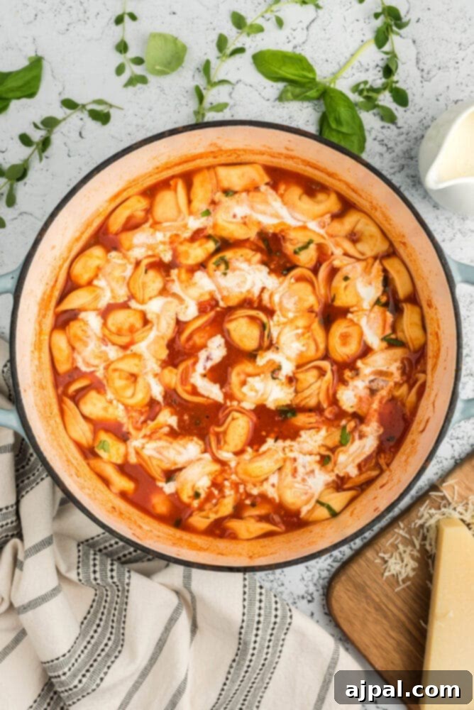 Soup simmering with tortellini
