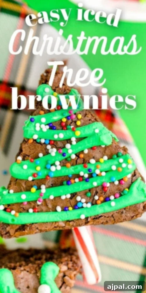 Festive Fudgy Evergreen Brownies 22 A festive close-up of an easy iced Christmas tree brownie, showcasing the rich chocolate and vibrant green decoration.
