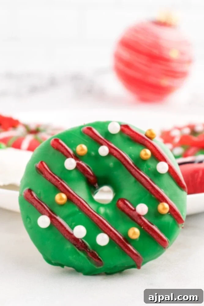 Effortless Christmas Wreath Cookies 18 A delightful close-up of a festive Christmas wreath cookie, showcasing its vibrant colors and intricate candy decorations.