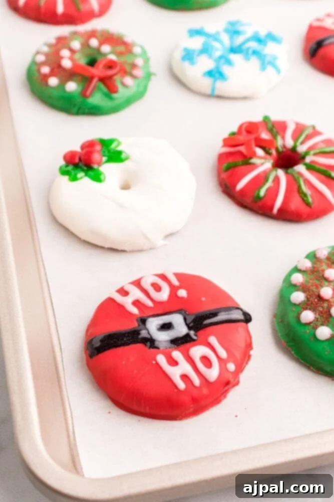 Effortless Christmas Wreath Cookies 19 A charming collection of iced cookies, each uniquely decorated to resemble festive Christmas wreaths, perfect for holiday cheer.