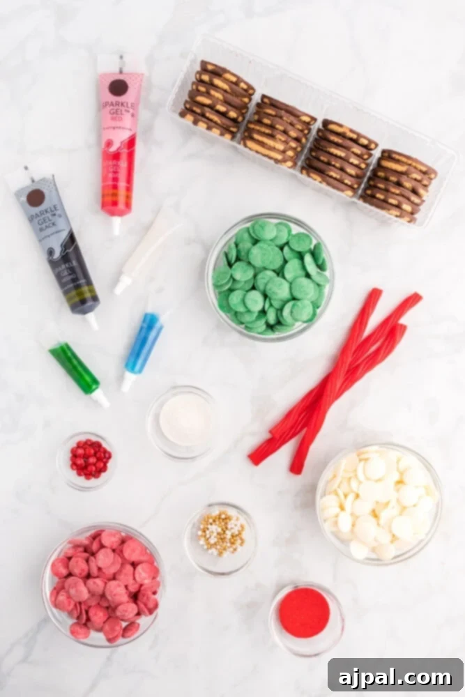 Effortless Christmas Wreath Cookies 4 An inviting display of various Christmas wreath cookies, along with festive candies and treats, artfully arranged on a sleek marble table.