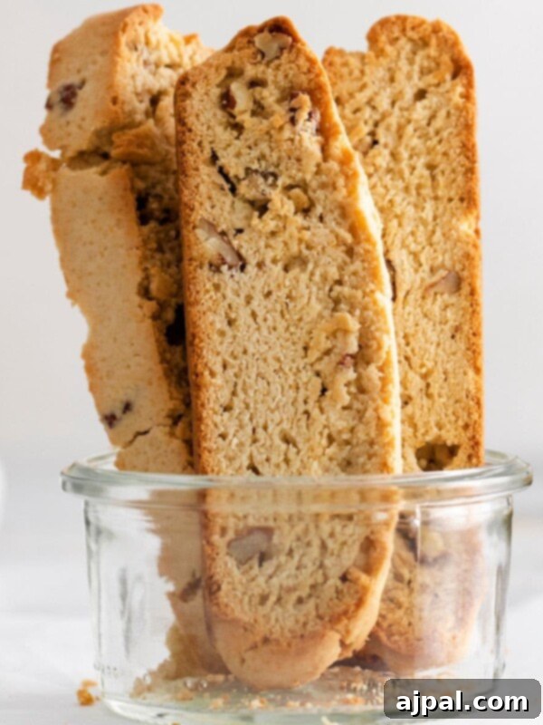 baked biscotti with pecan in a jar on a table