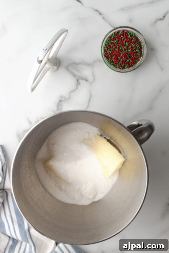 picture of butter and sugar in a bowl of a stand mixer
