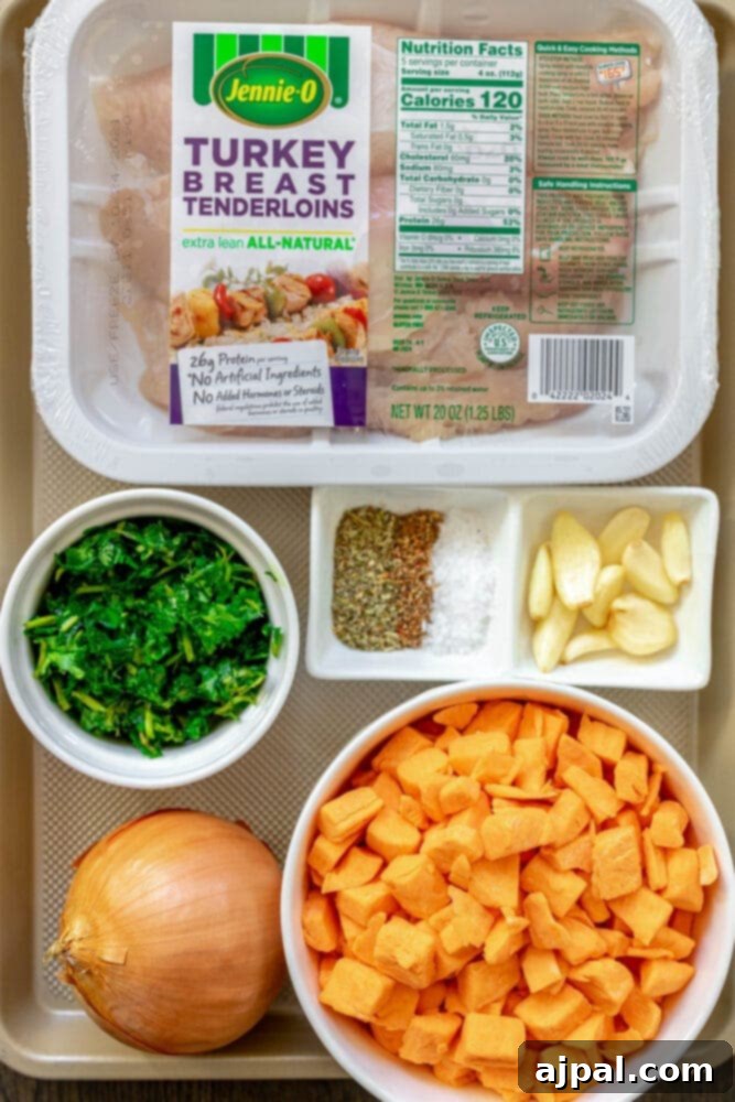 Roasted Turkey Tenderloin and Sweet Potatoes 5 picture of turkey, potatoes, onion, and herbs on a table