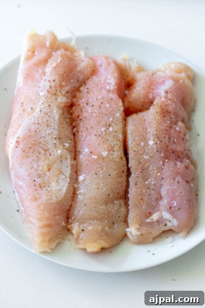 Roasted Turkey Tenderloin and Sweet Potatoes 7 picture of turkey tenderloins with salt and pepper