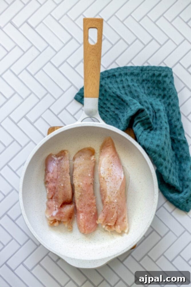 Roasted Turkey Tenderloin and Sweet Potatoes 8 picture of turkey tenderloins in a pan
