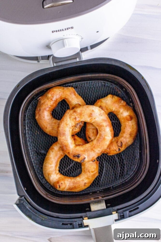picture of cinnamon raisin bagels in an air fryer