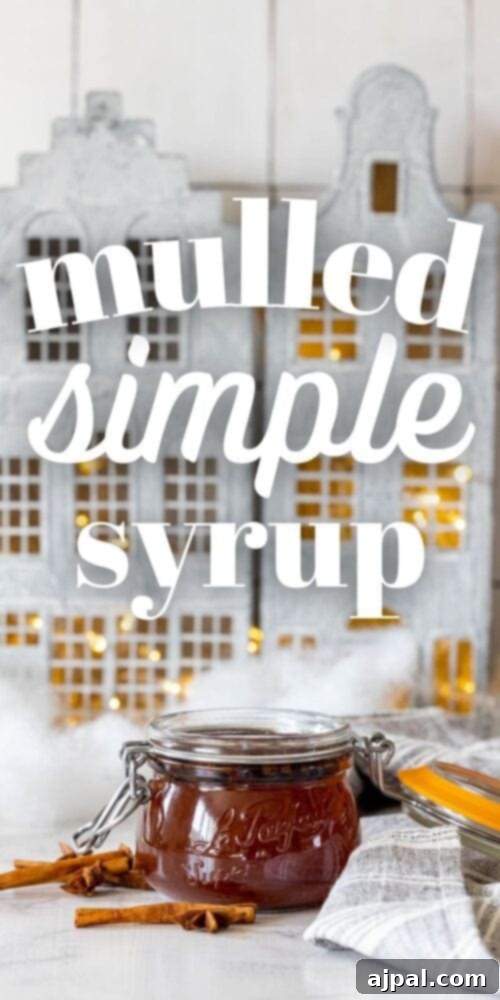 Warming Winter Spice Syrup 8 Picture of Mulled Simple Syrup with Cinnamon Sticks on a Table.