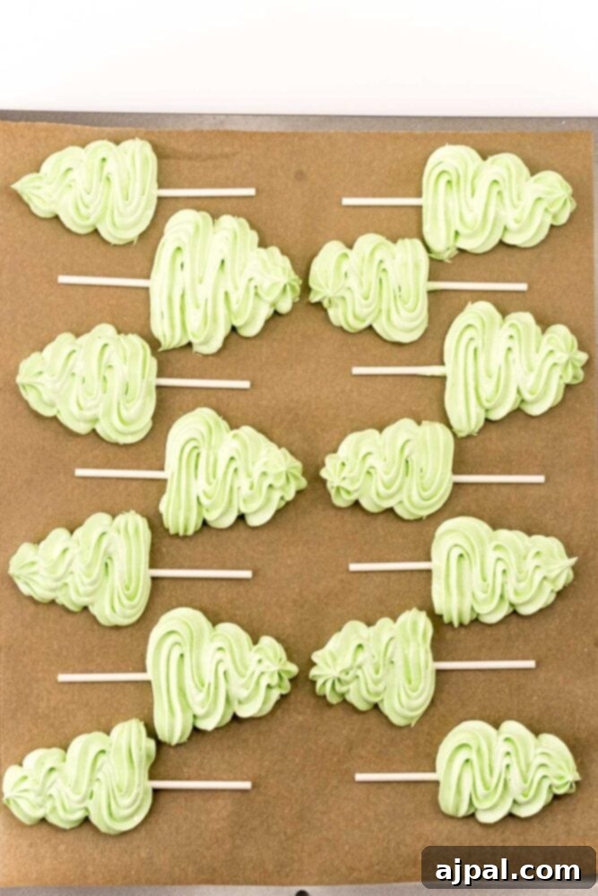 picture of meringue christmas tree piped onto parchment paper