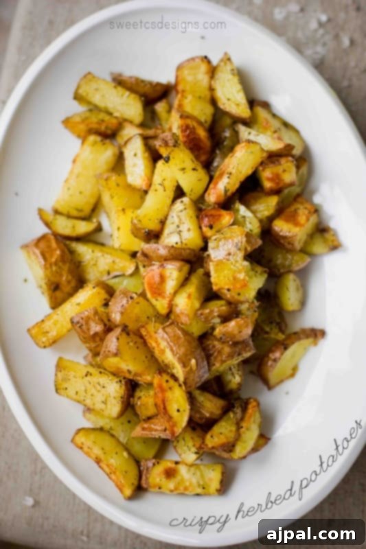 Crispy roasted potatoes on a table.
