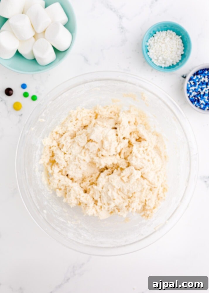 Snowman Meltdown Cookies 7 picture of perfectly mixed cookie dough in a bowl, showing its smooth consistency