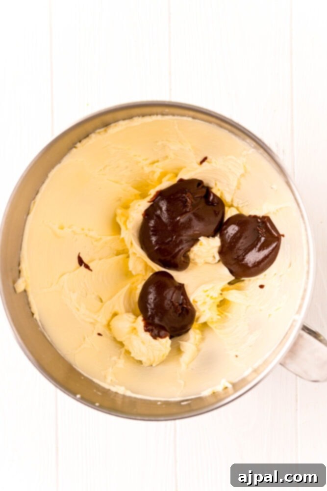 Creamed butter and chocolate pudding mixture combined in a bowl