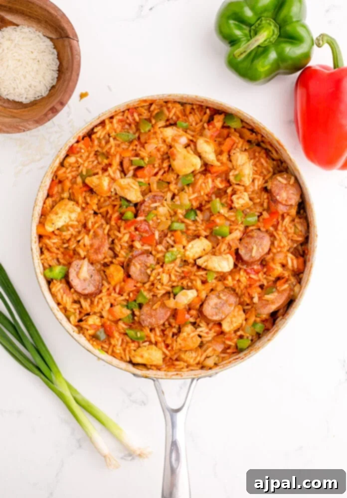 picture of jambalaya with cooked rice in a pan